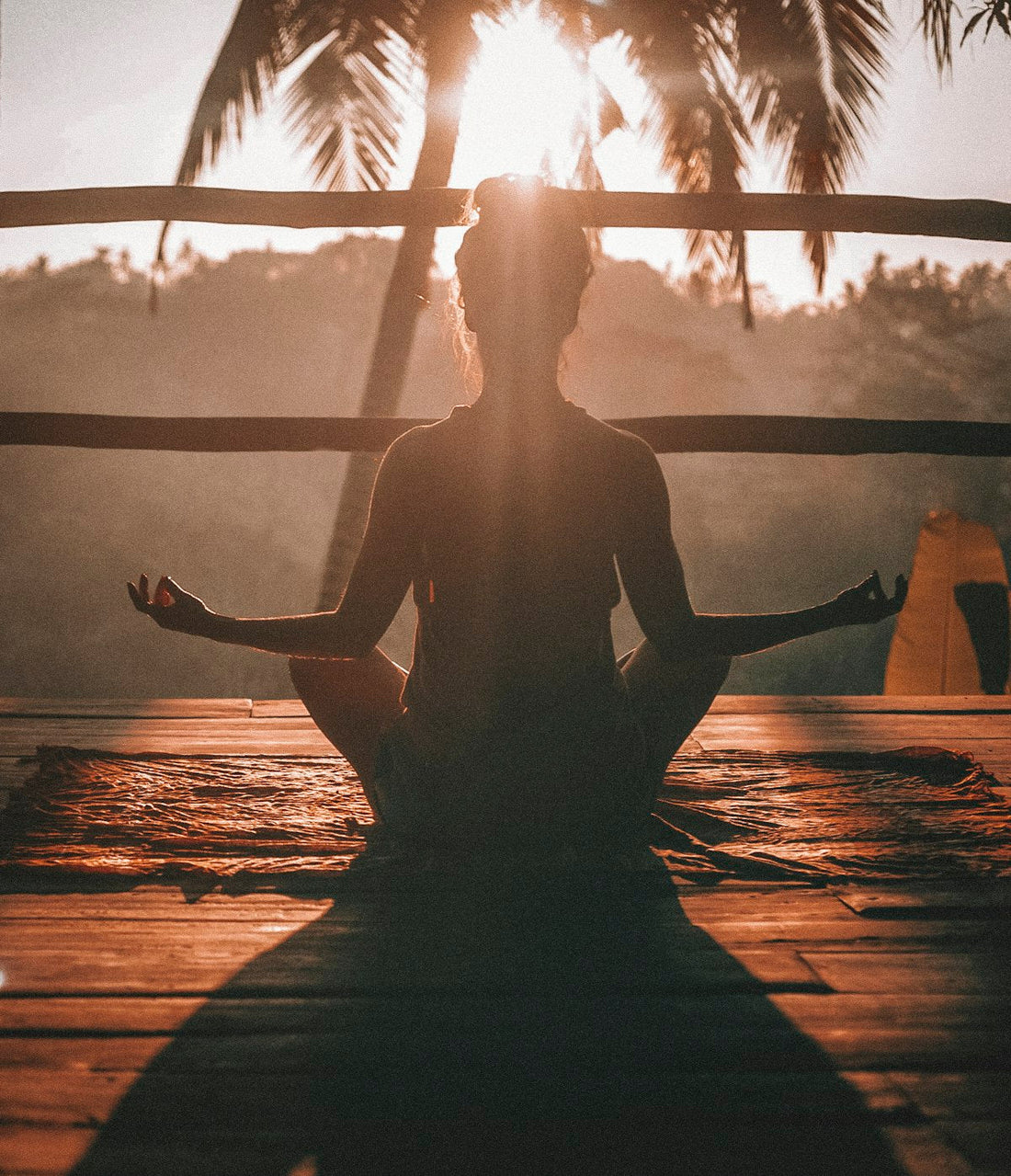 Person practicing morning wellness routine